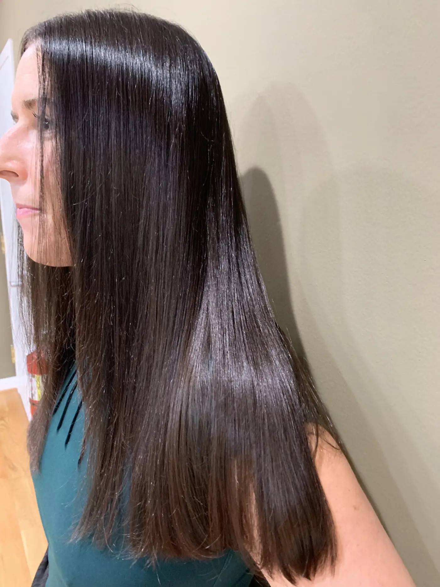 Long dark hair after a Brazilian Blowout.