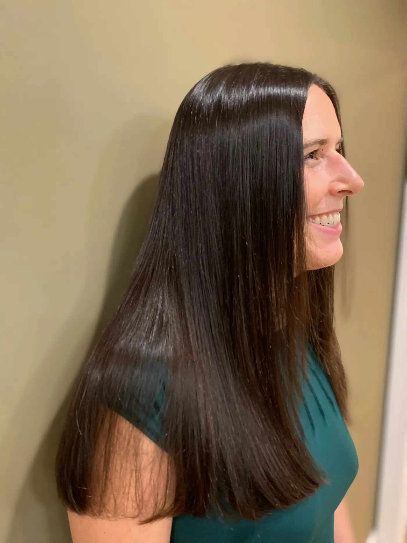 Another view of the same client after her Brazilian Blowout.
