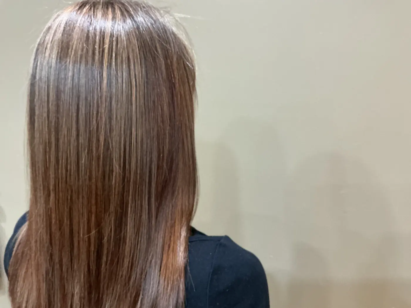 Long hair after a Brazilian Blowout, from behind.